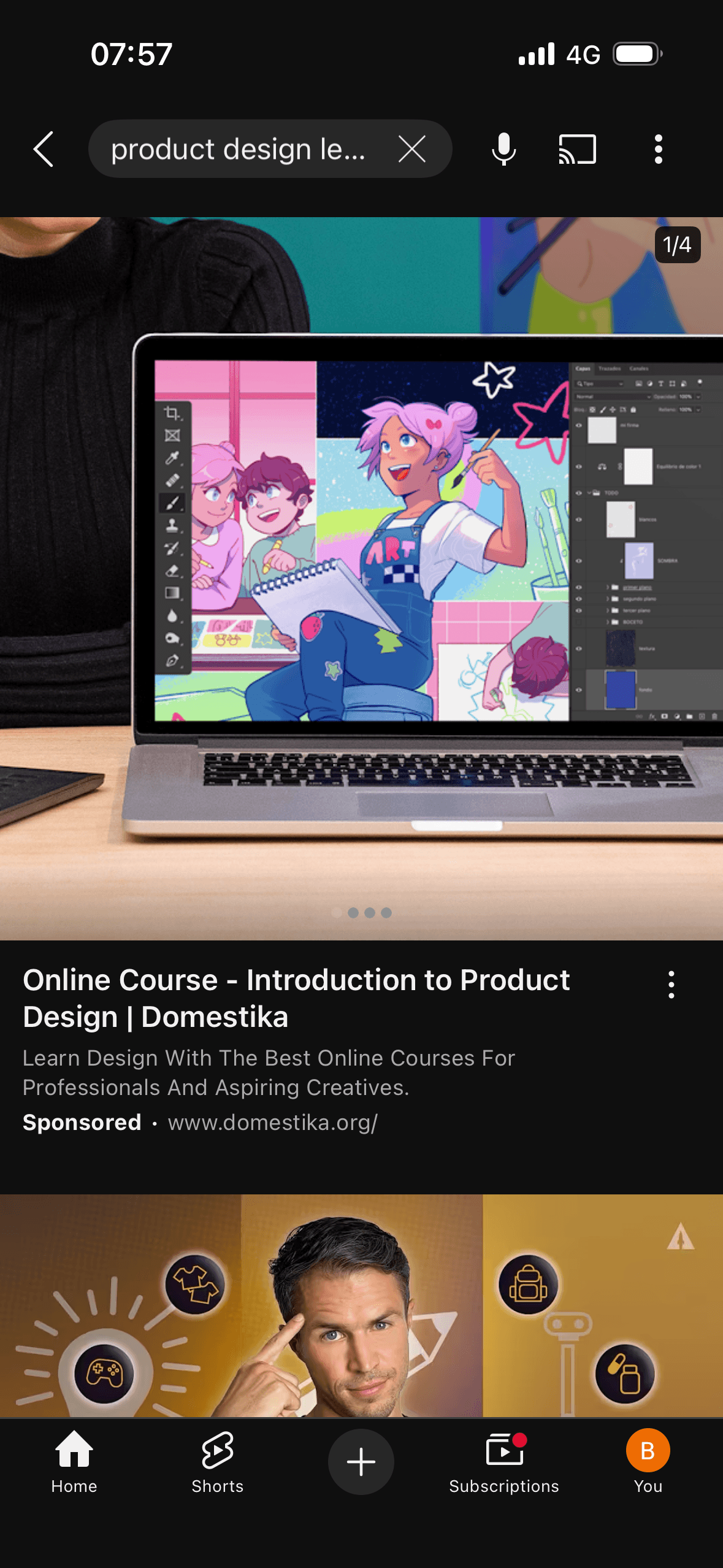 YouTube: Search results with sponsored result